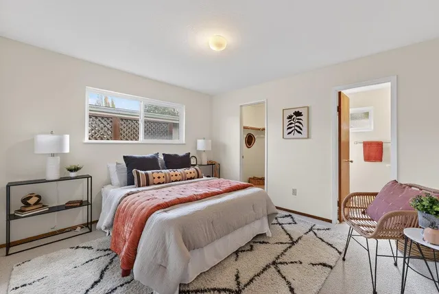 a bedroom with a bed and furniture