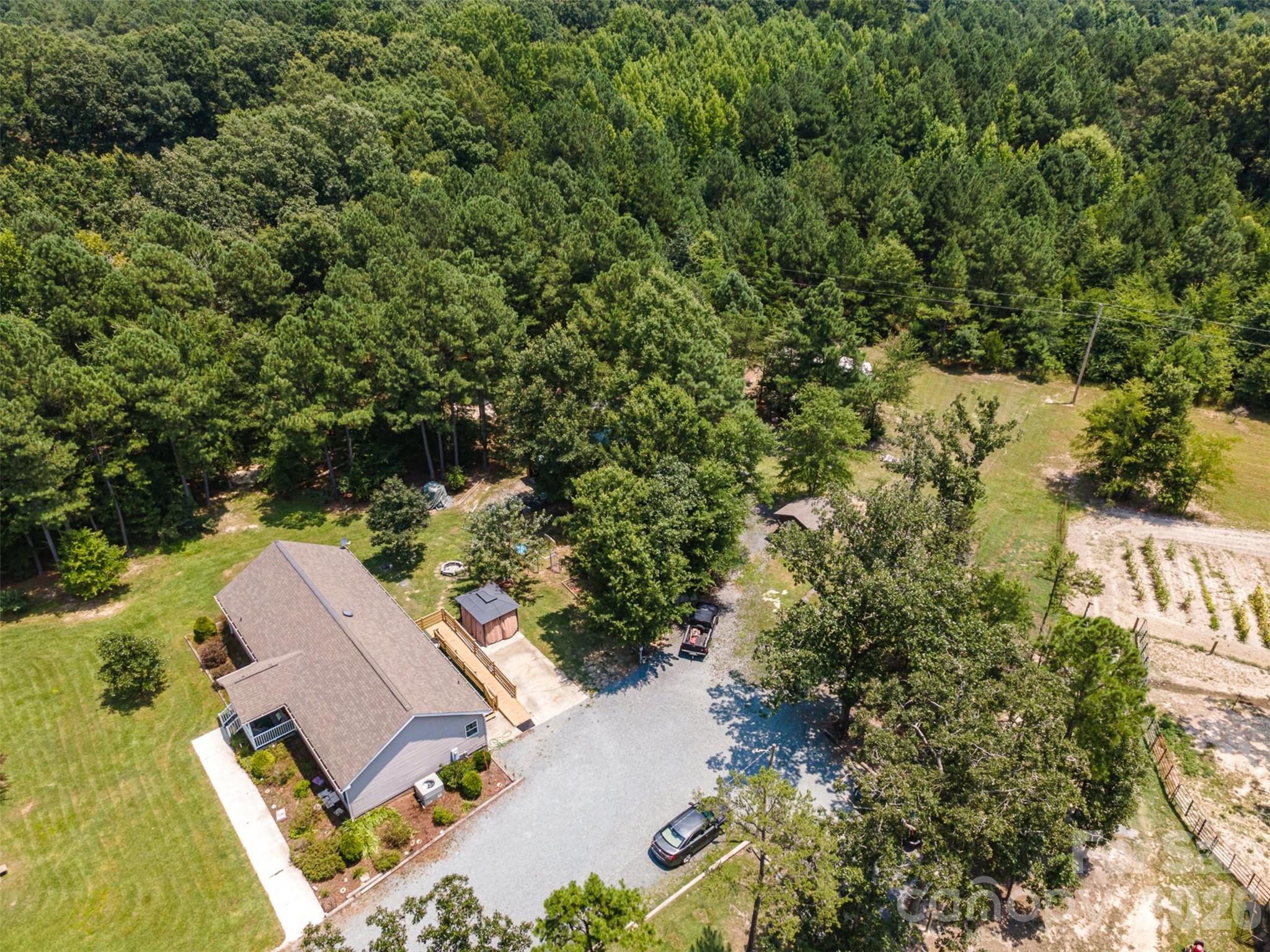 5602 Flint Ridge Marshville, NC 28103 - Photo 22 of 26 an aerial view of residential house with outdoor space