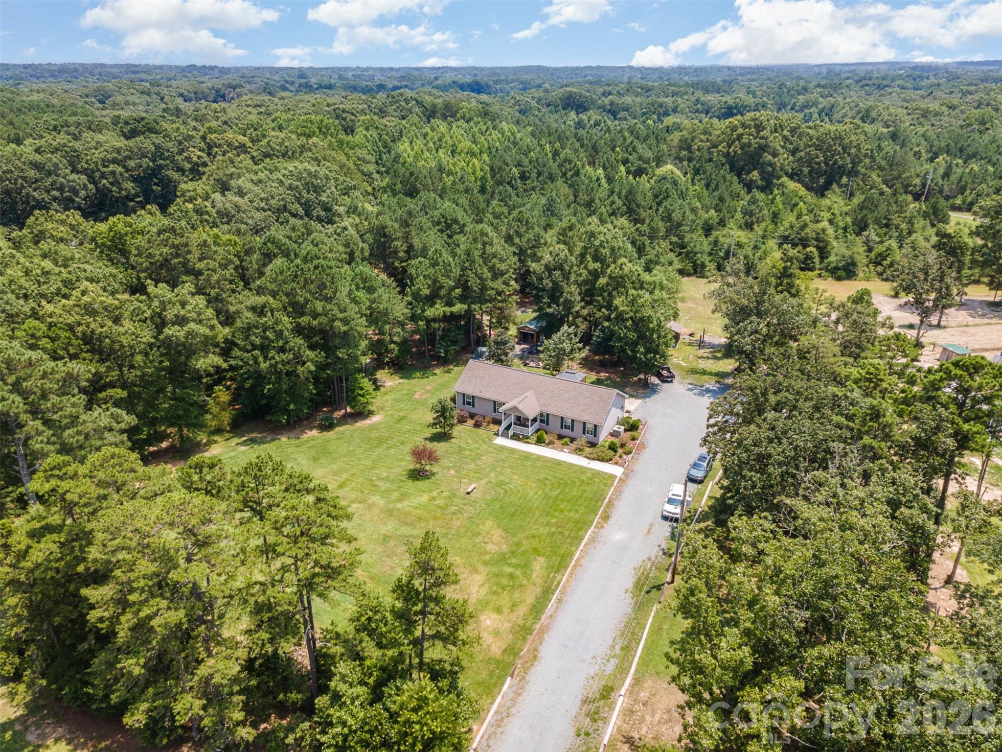 5602 Flint Ridge Marshville, NC 28103 - Photo 25 of 26 a view of a yard with an ocean