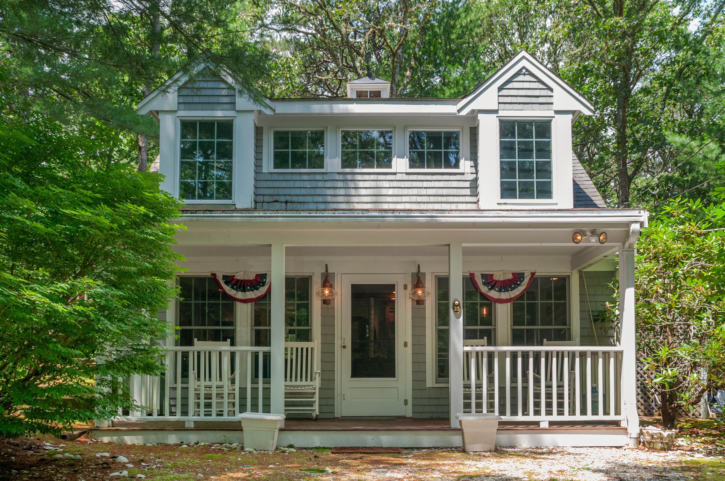 23 Paula Lane Cotuit, MA 02635 - Photo 1 of 23 a front view of a house with a yard