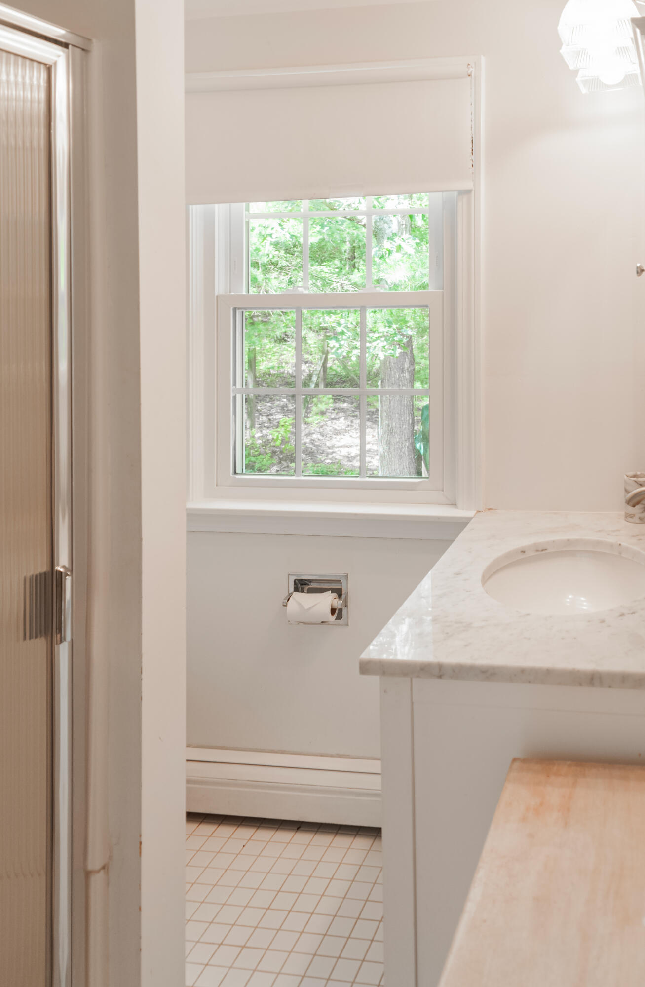 23 Paula Lane Cotuit, MA 02635 - Photo 22 of 23 a bathroom with a granite countertop sink and a shower curtain