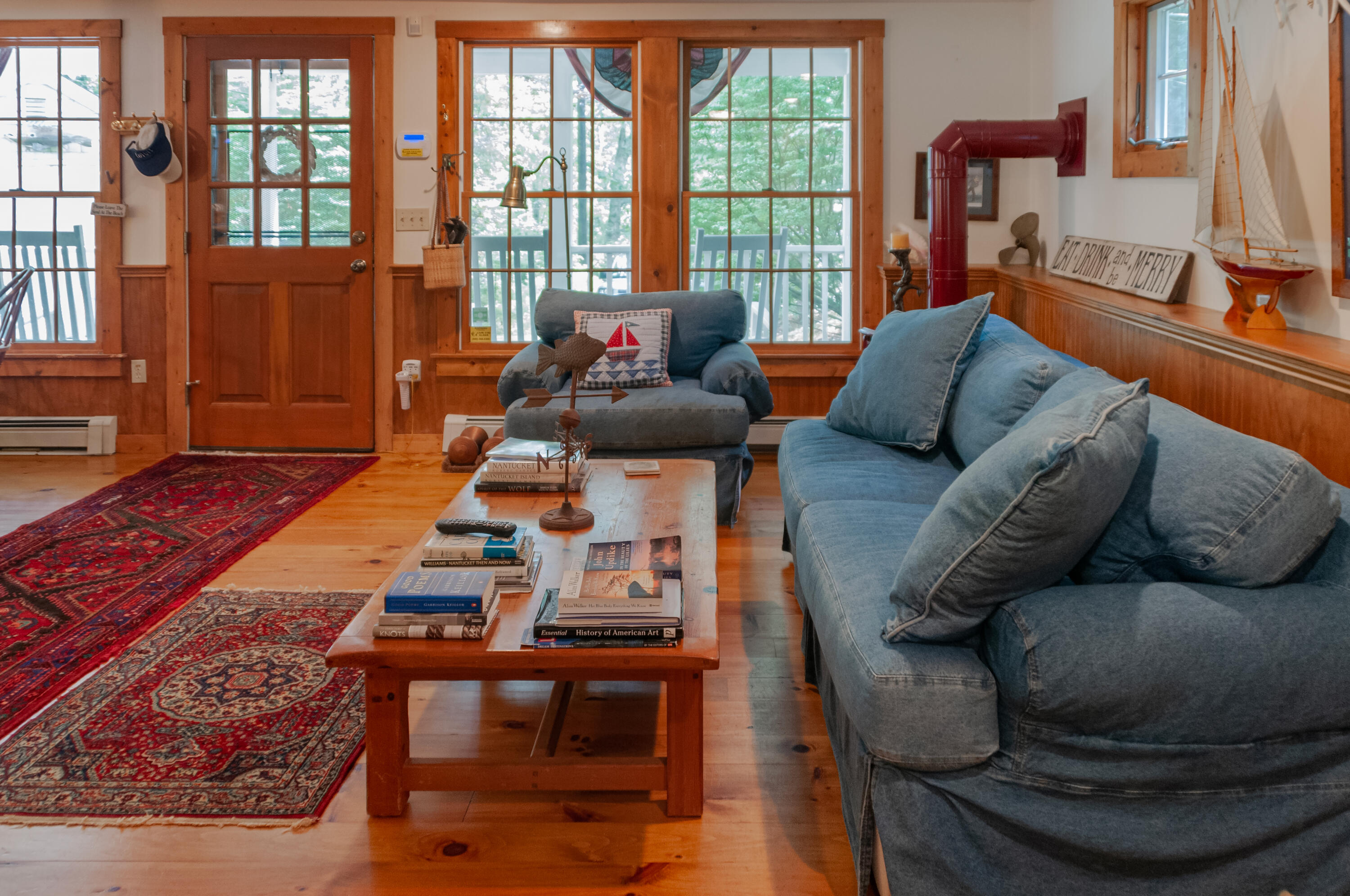 23 Paula Lane Cotuit, MA 02635 - Photo 3 of 23 a living room with furniture and a floor to ceiling window