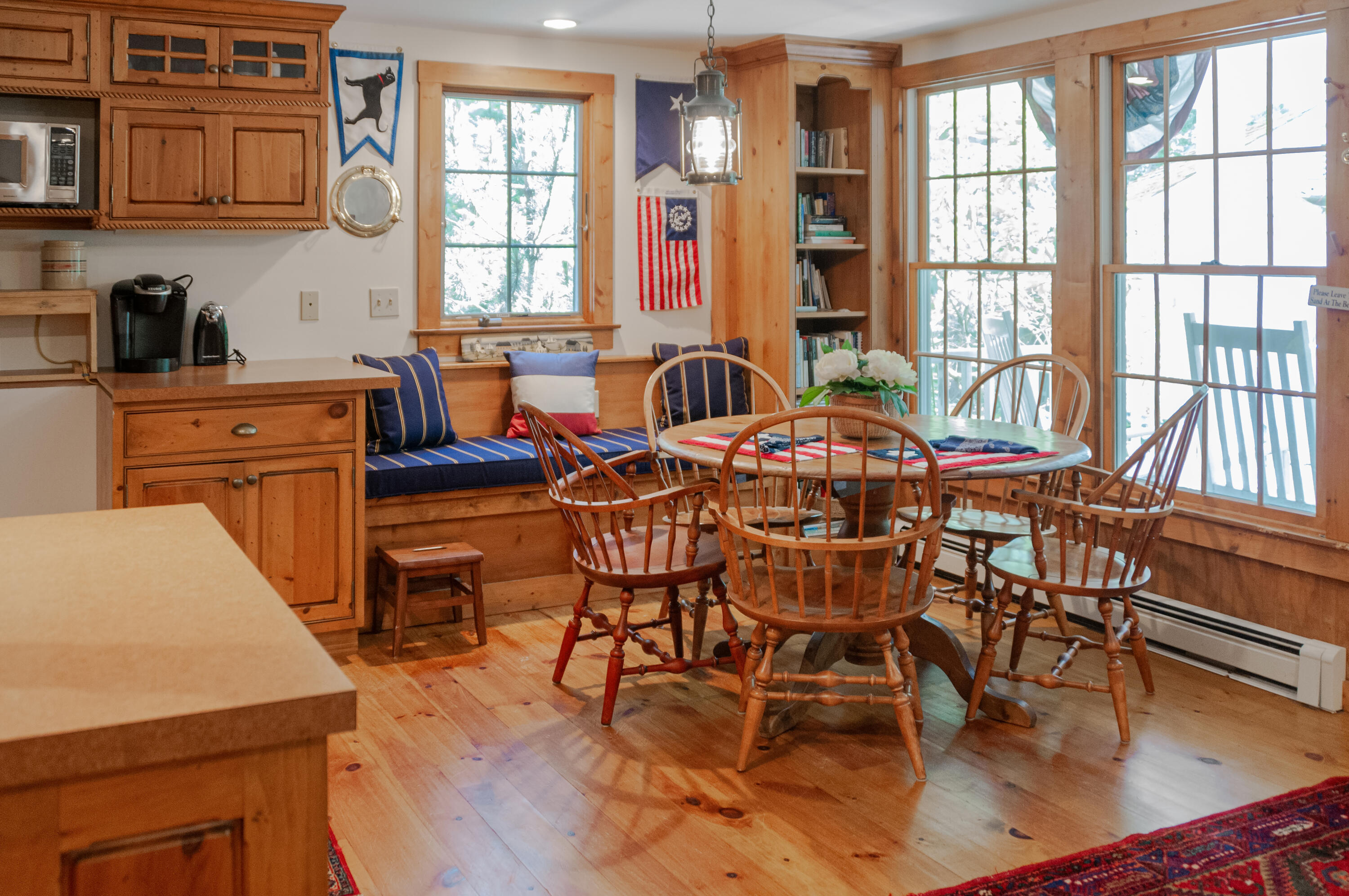 23 Paula Lane Cotuit, MA 02635 - Photo 7 of 23 a view of a dining room with furniture window and outside view
