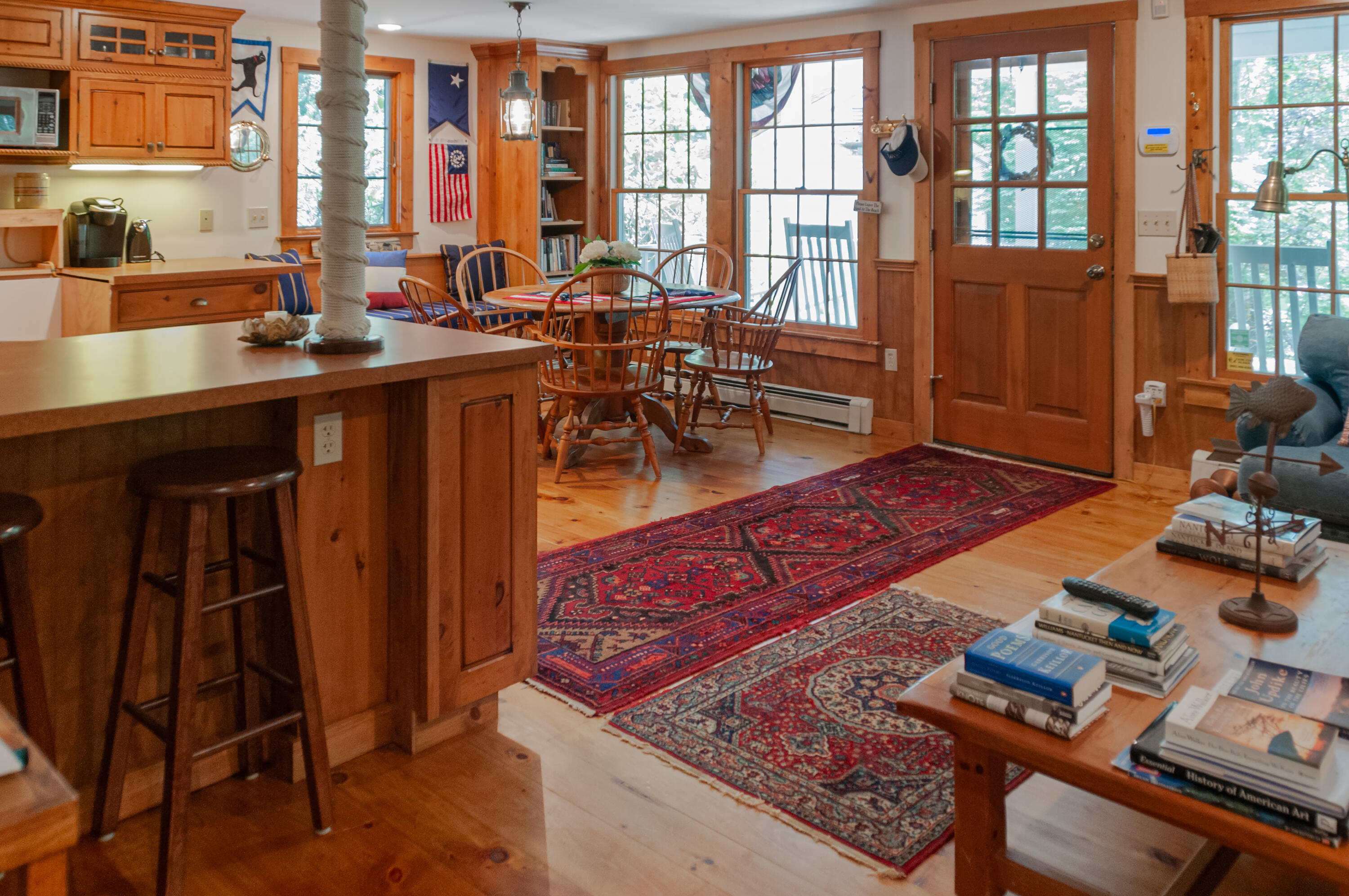 23 Paula Lane Cotuit, MA 02635 - Photo 9 of 23 a living room with furniture and large windows