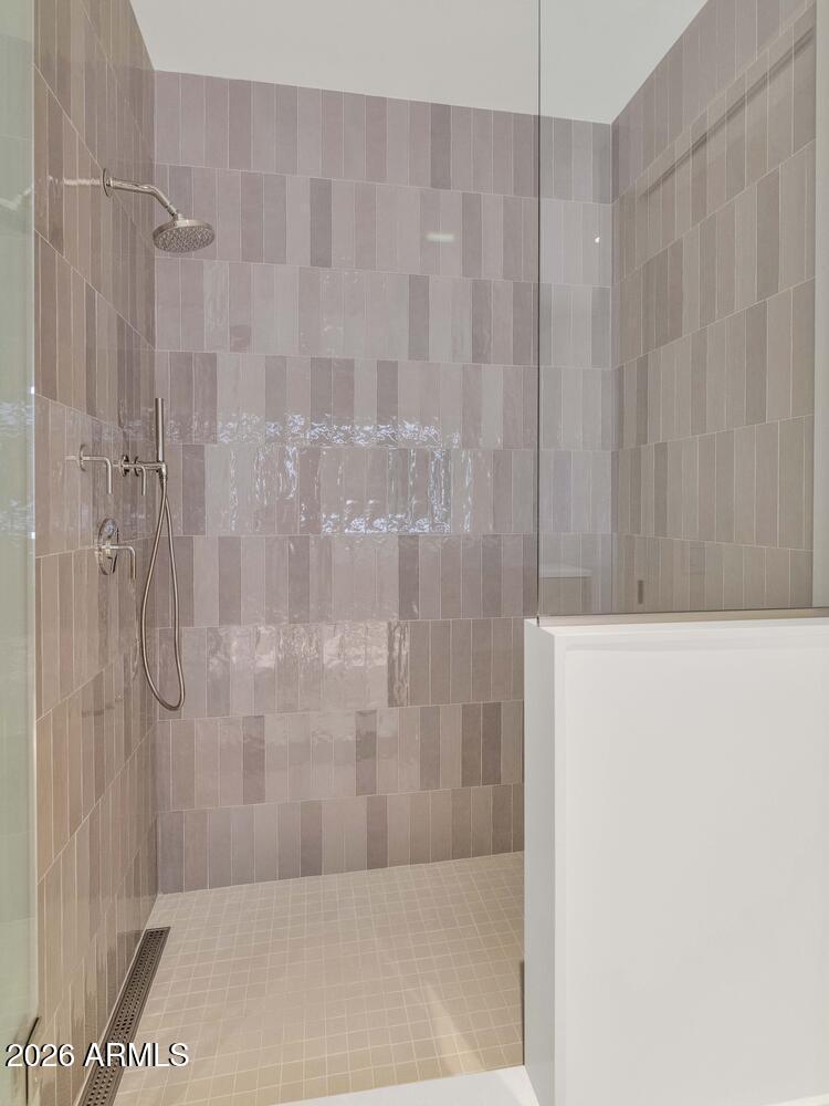 4849 North Camelback Ridge Road, Unit B203 Scottsdale, AZ 85251 - Photo 16 of 30 a bathroom with a shower