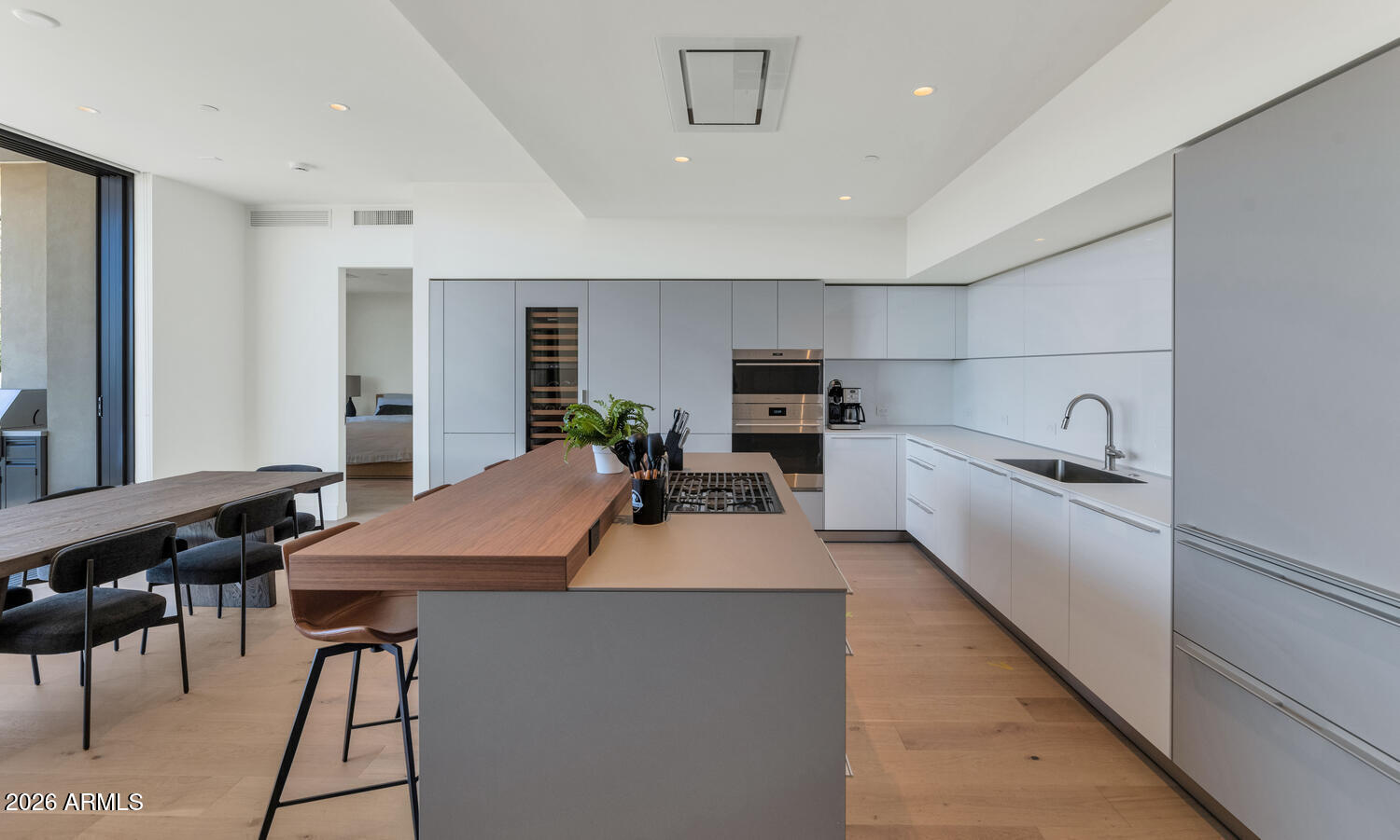 4849 North Camelback Ridge Road, Unit B203 Scottsdale, AZ 85251 - Photo 8 of 30 a kitchen with cabinets a sink and appliances
