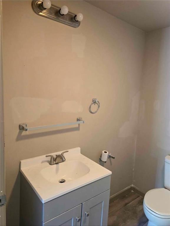 1001 19th Avenue Altoona, PA 16601 - Photo 11 of 19 a bathroom with a sink a toilet and vanity