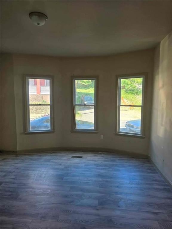1001 19th Avenue Altoona, PA 16601 - Photo 9 of 19 a view of an empty room with wooden floor and a window