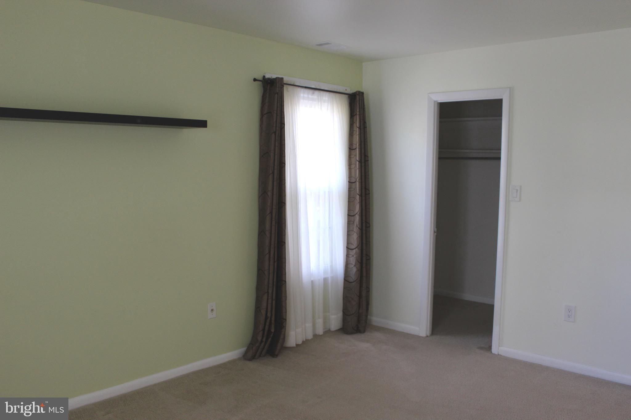 12716 Builders Road Herndon, VA 20170 - Photo 12 of 30 Master bedroom on main level with walk-in closet
