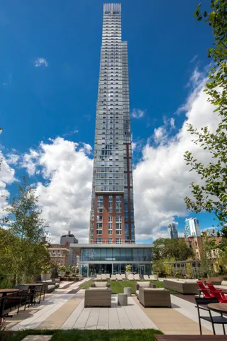 a view of a city with tall buildings