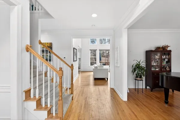 a view of a living room and dining room