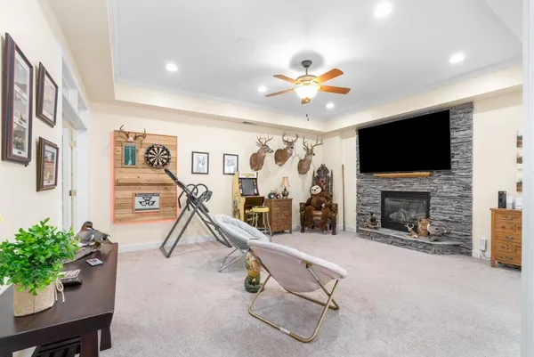 a view of a livingroom with furniture and window