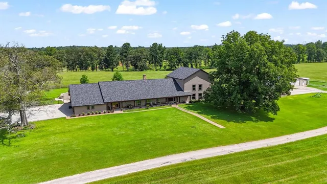 a house view with a garden space