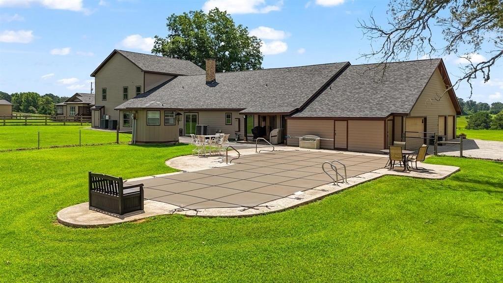 11074 State Highway 64 Overton, TX 75684 - Photo 14 of 40 a front view of house with yard and green space