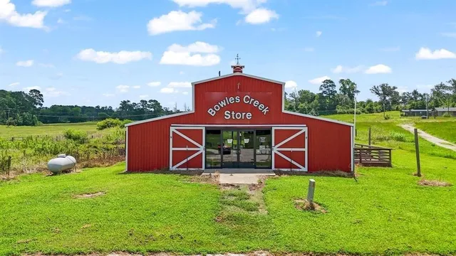 a view of a deck with a yard