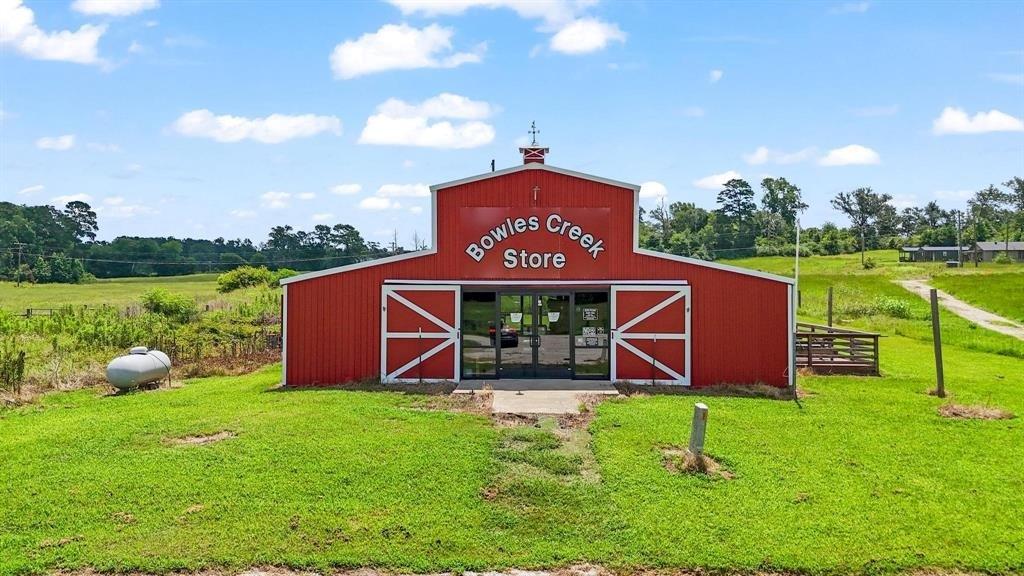 11074 State Highway 64 Overton, TX 75684 - Photo 28 of 40 a view of house with backyard