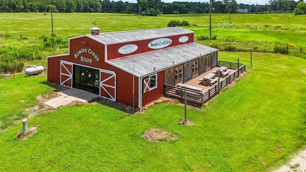 11074 State Highway 64 Overton, TX 75684 - Photo 29 of 40 a view of a deck with a yard