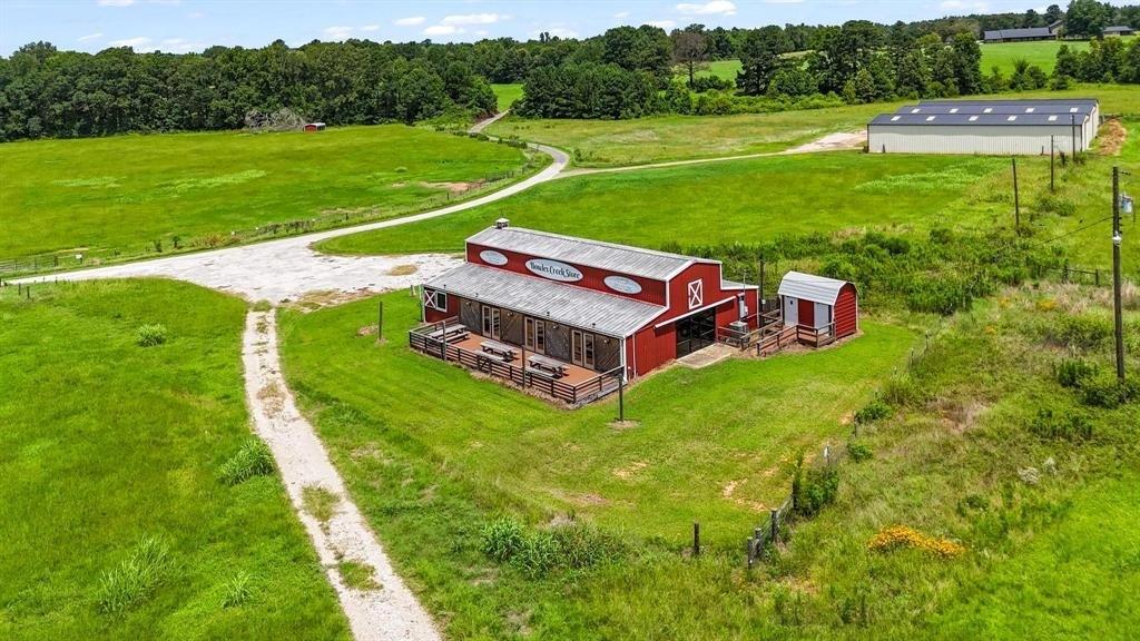 11074 State Highway 64 Overton, TX 75684 - Photo 32 of 40 a view of a backyard with a big yard