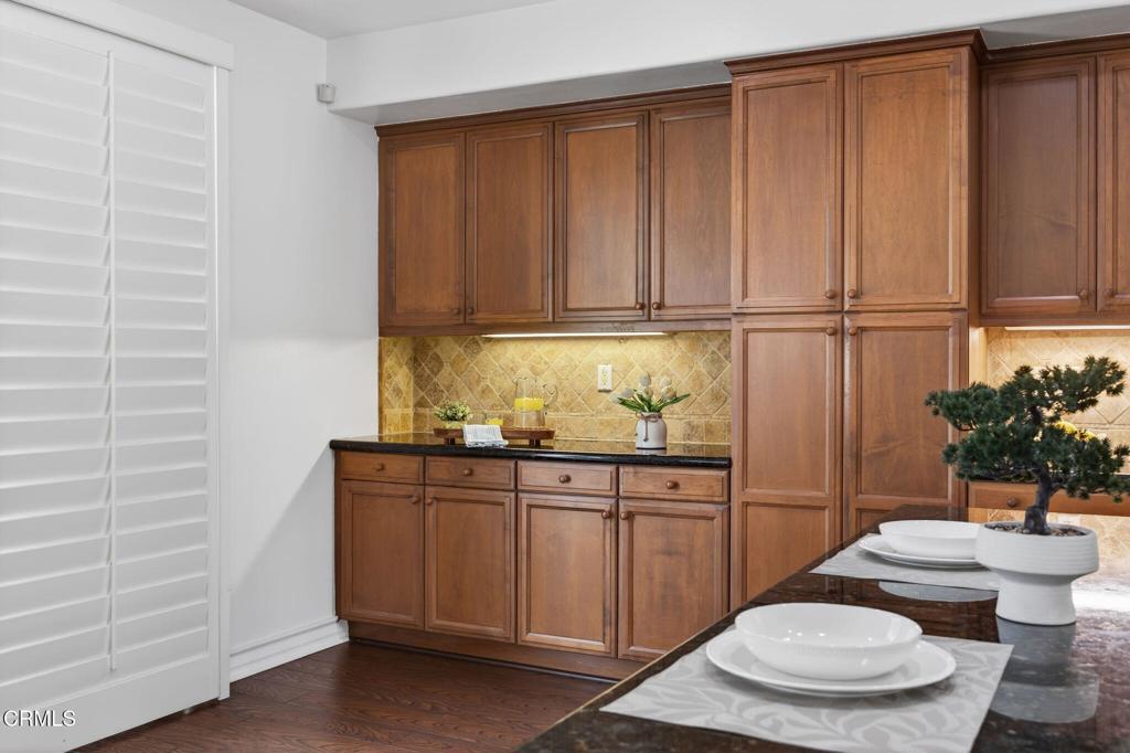 740 Freeport Lane Oxnard, CA 93035 - Photo 12 of 35 a kitchen with a sink a toilet and potted plant