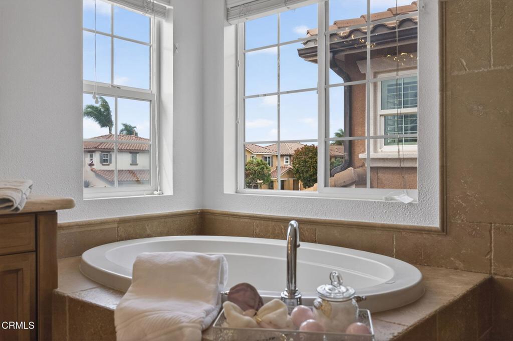 740 Freeport Lane Oxnard, CA 93035 - Photo 26 of 35 a bath tub sitting next to a window