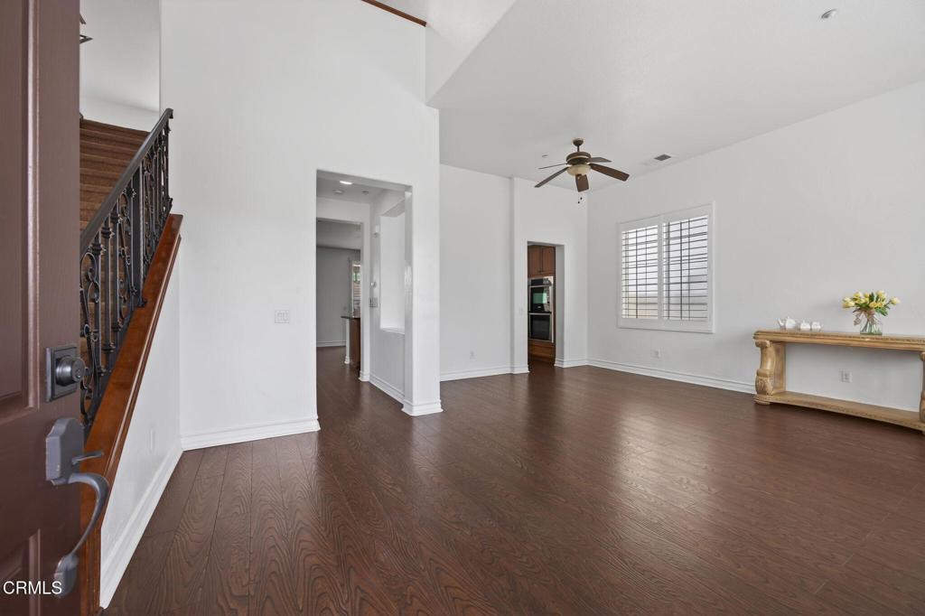 740 Freeport Lane Oxnard, CA 93035 - Photo 3 of 35 an empty room with wooden floor and windows