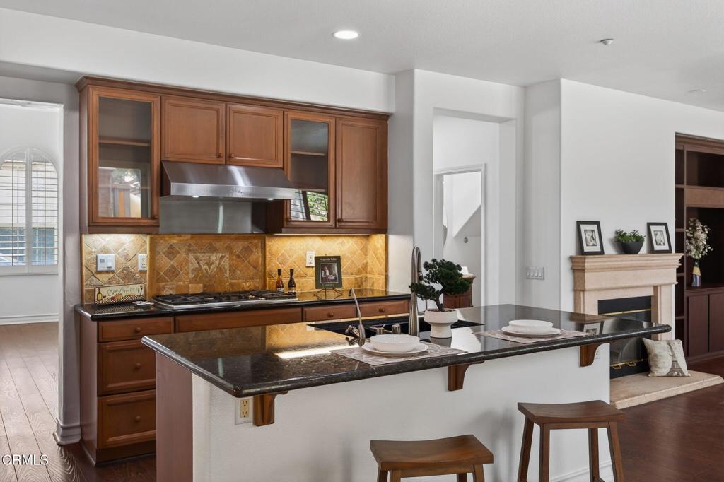 740 Freeport Lane Oxnard, CA 93035 - Photo 8 of 35 a kitchen with a sink and stove