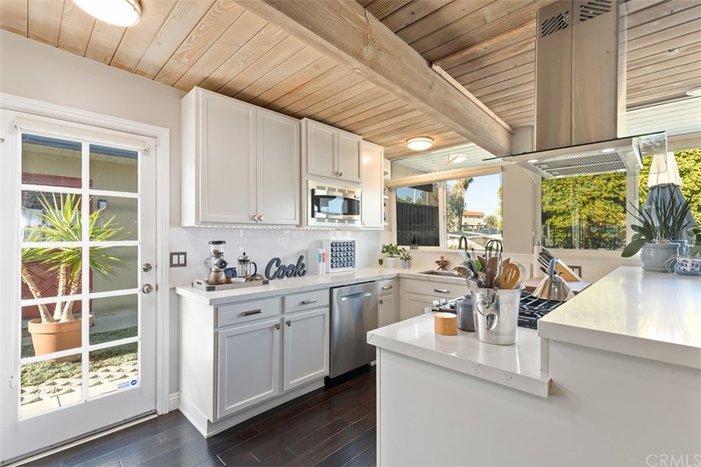 198 Del Gado Road San Clemente, CA 92672 - Photo 13 of 47 Brand new crisp and fresh counter tops with a farm sink.