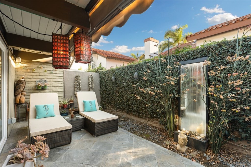 198 Del Gado Road San Clemente, CA 92672 - Photo 22 of 47 Back yard bliss while you get a little sun and listen to the fountain.
