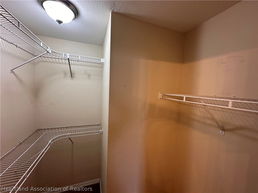 8737 Capilla Street Sebring, FL 33872 - Photo 26 of 43 a close up of a shower