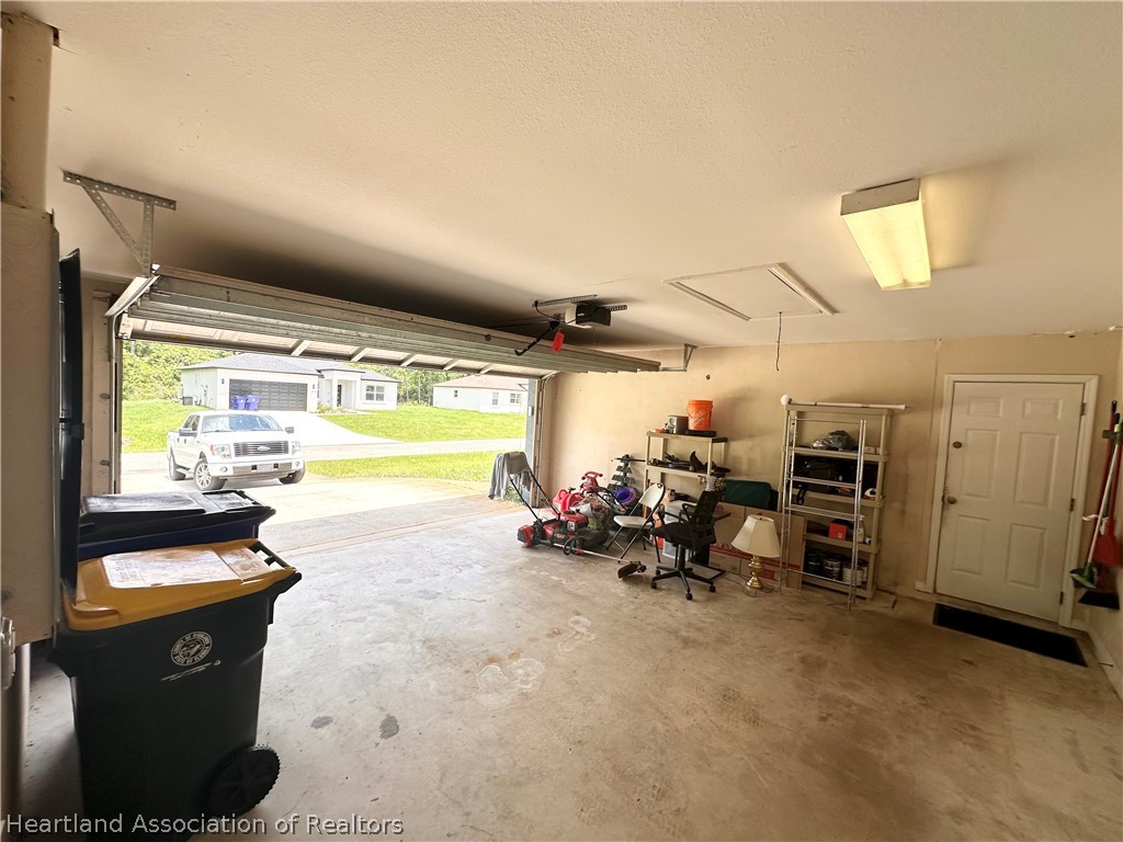 8737 Capilla Street Sebring, FL 33872 - Photo 37 of 43 a view of a room with gym equipment