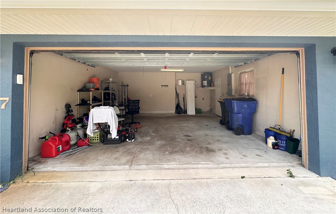 8737 Capilla Street Sebring, FL 33872 - Photo 38 of 43 a view of a garage