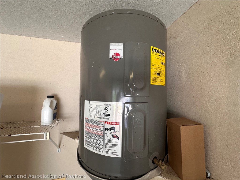 8737 Capilla Street Sebring, FL 33872 - Photo 40 of 43 a view of water heater