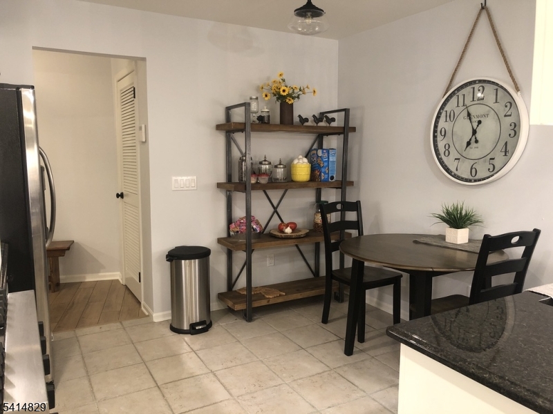 173 Riveredge Drive Chatham, NJ 07928 - Photo 3 of 11 a view of a workspace with furniture