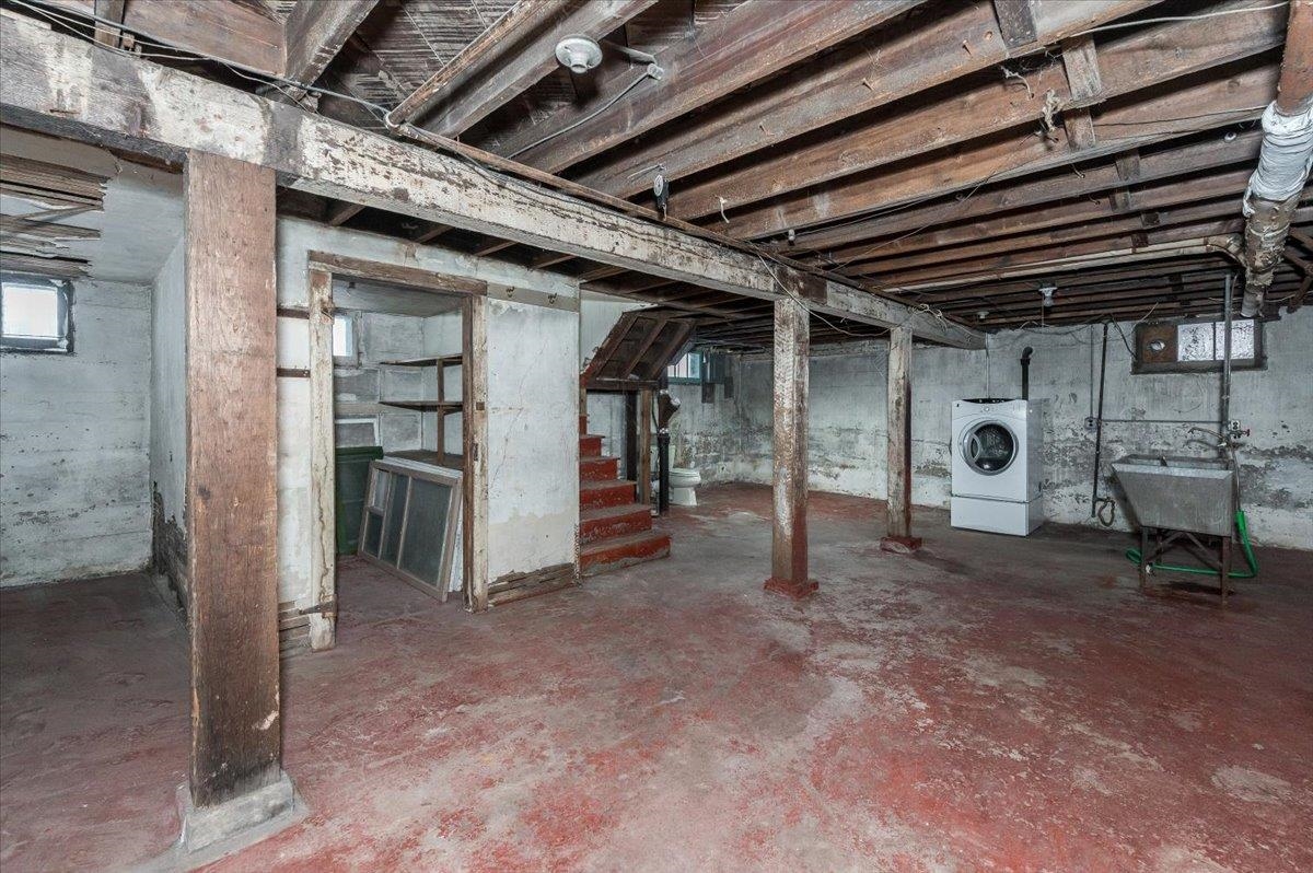 701 East 4th Street Superior, WI 54880 - Photo 12 of 16 Below grade area featuring washer / dryer and stairs