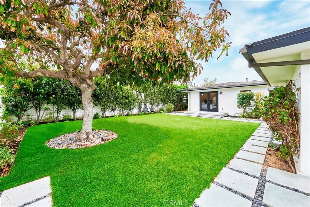 345 Broadway Costa Mesa, CA 92627 - Photo 18 of 20 a front view of a house with a yard