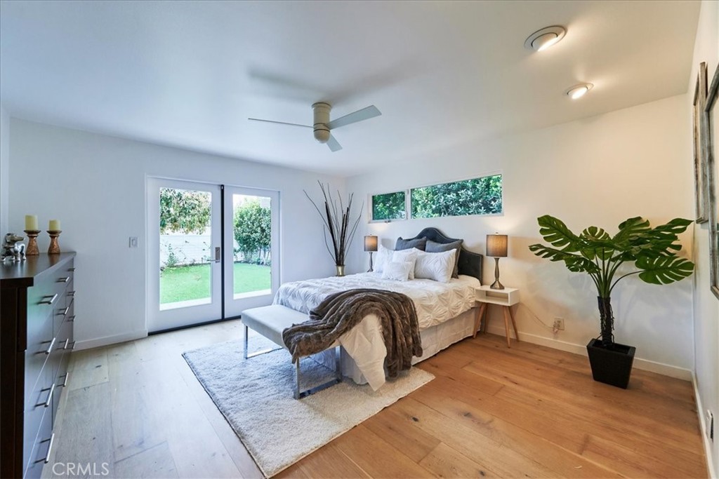 345 Broadway Costa Mesa, CA 92627 - Photo 9 of 20 a living room with furniture flowerpot and a potted plant