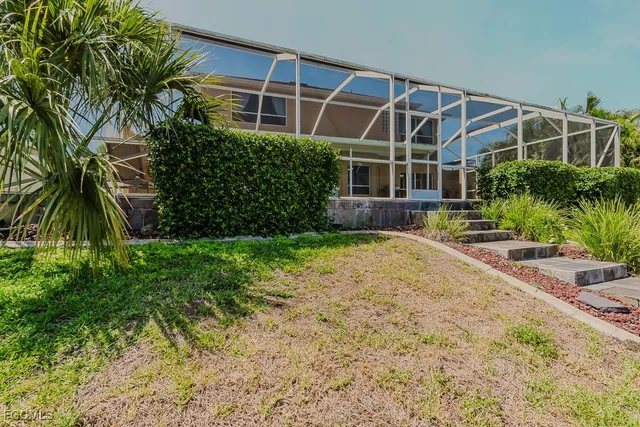 a front view of a house having yard