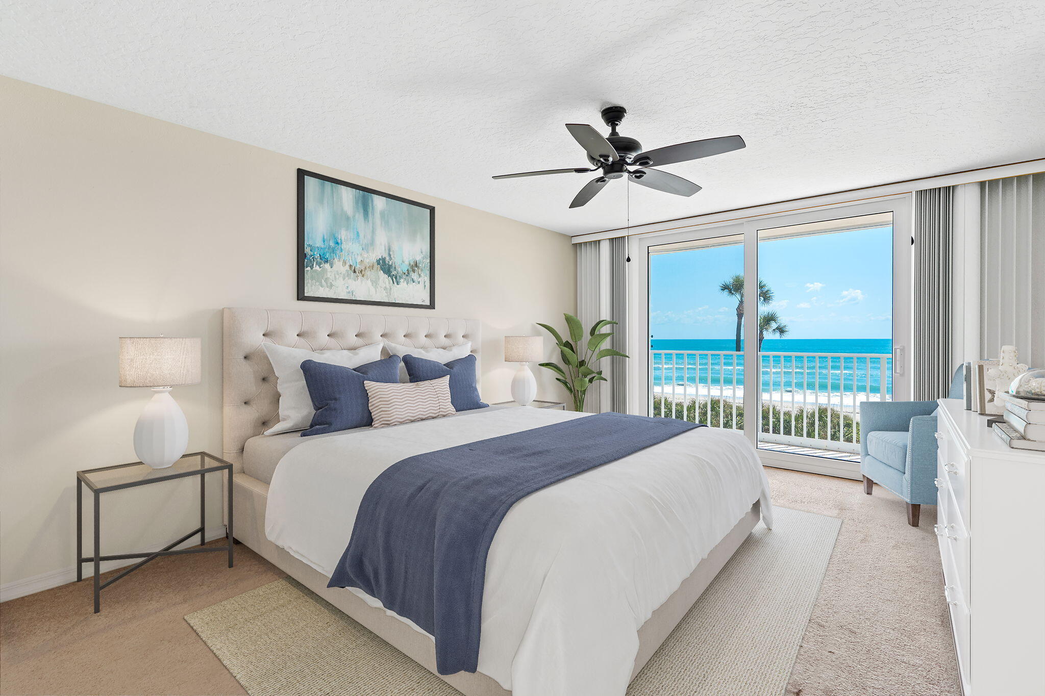 1505 North Hwy A1A, Unit 304 Indialantic, FL 32903 - Photo 11 of 27 a bedroom with a large bed and a chandelier