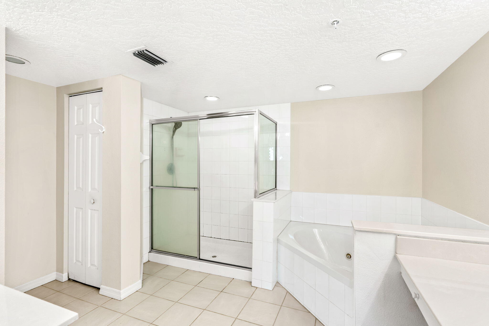 1505 North Hwy A1A, Unit 304 Indialantic, FL 32903 - Photo 14 of 27 a bathroom with a bathtub and a shower