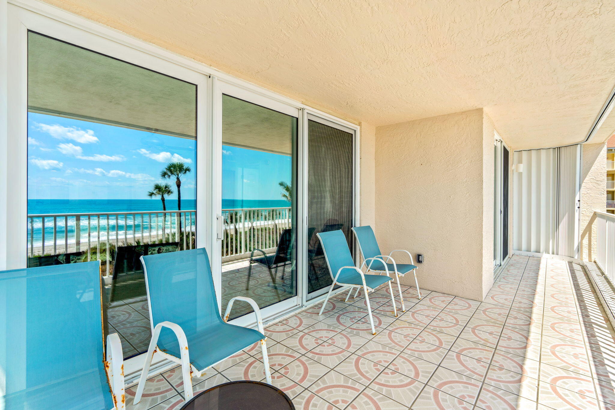 1505 North Hwy A1A, Unit 304 Indialantic, FL 32903 - Photo 18 of 27 a view of a dining room with furniture window and wooden floor