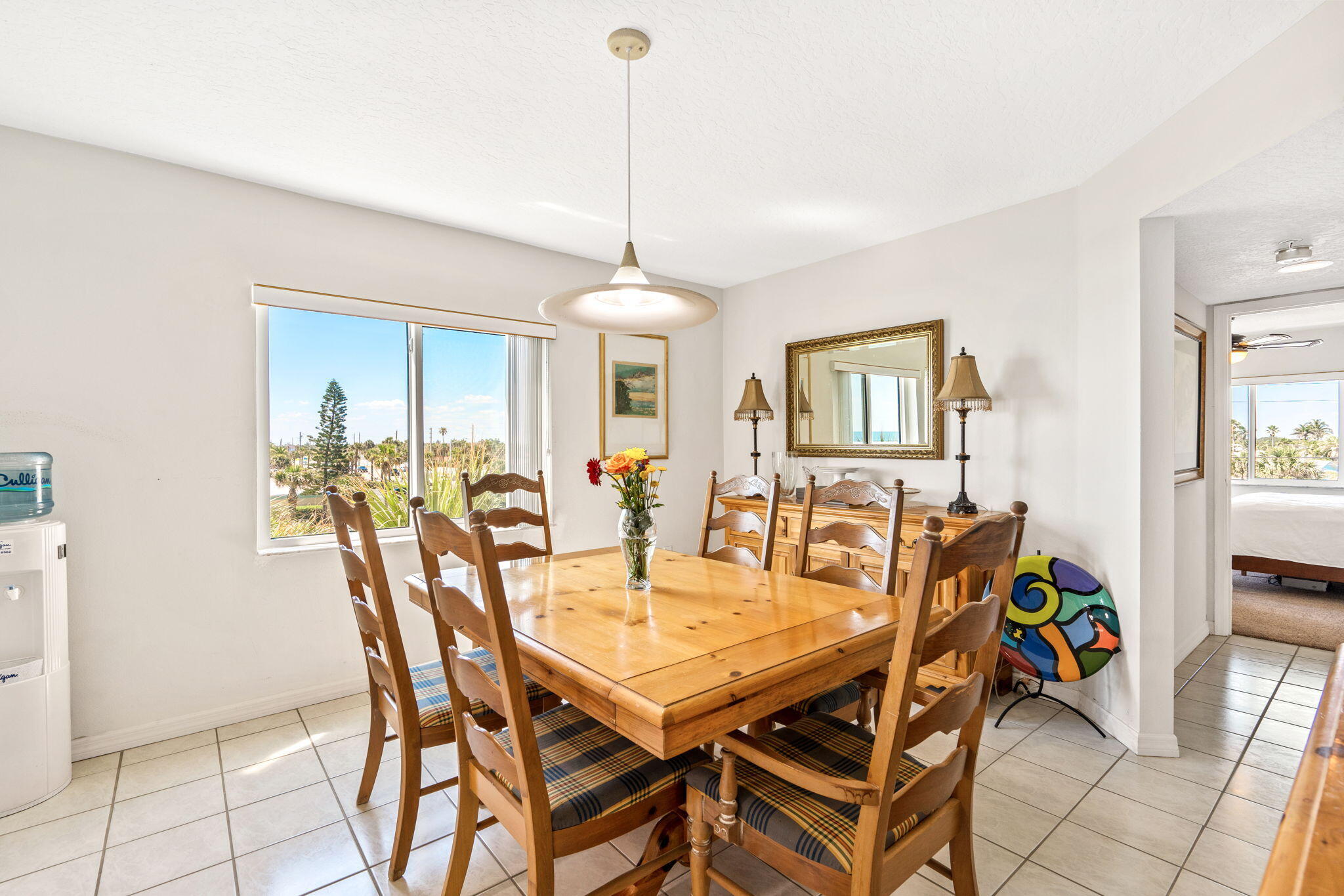 1505 North Hwy A1A, Unit 304 Indialantic, FL 32903 - Photo 9 of 27 a dining room with furniture and window