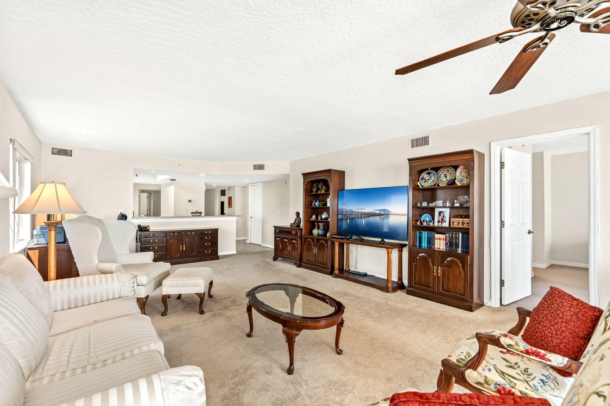 1505 North Hwy A1A, Unit 304 Indialantic, FL 32903 - Photo 10 of 27 a living room with furniture and a fireplace