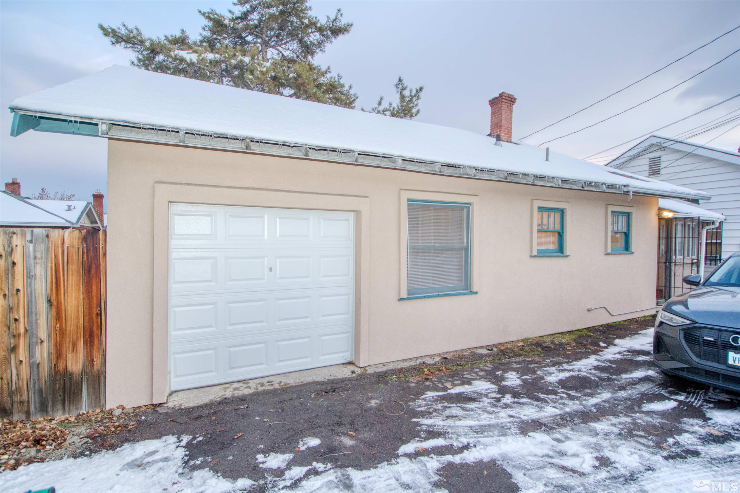 829 Plumas Street, Unit C Reno, NV 89509 - Photo 2 of 12 a view of a house with a wooden door
