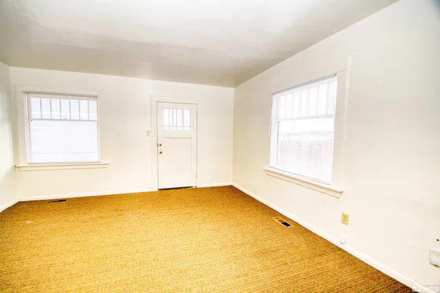 an empty room with a window