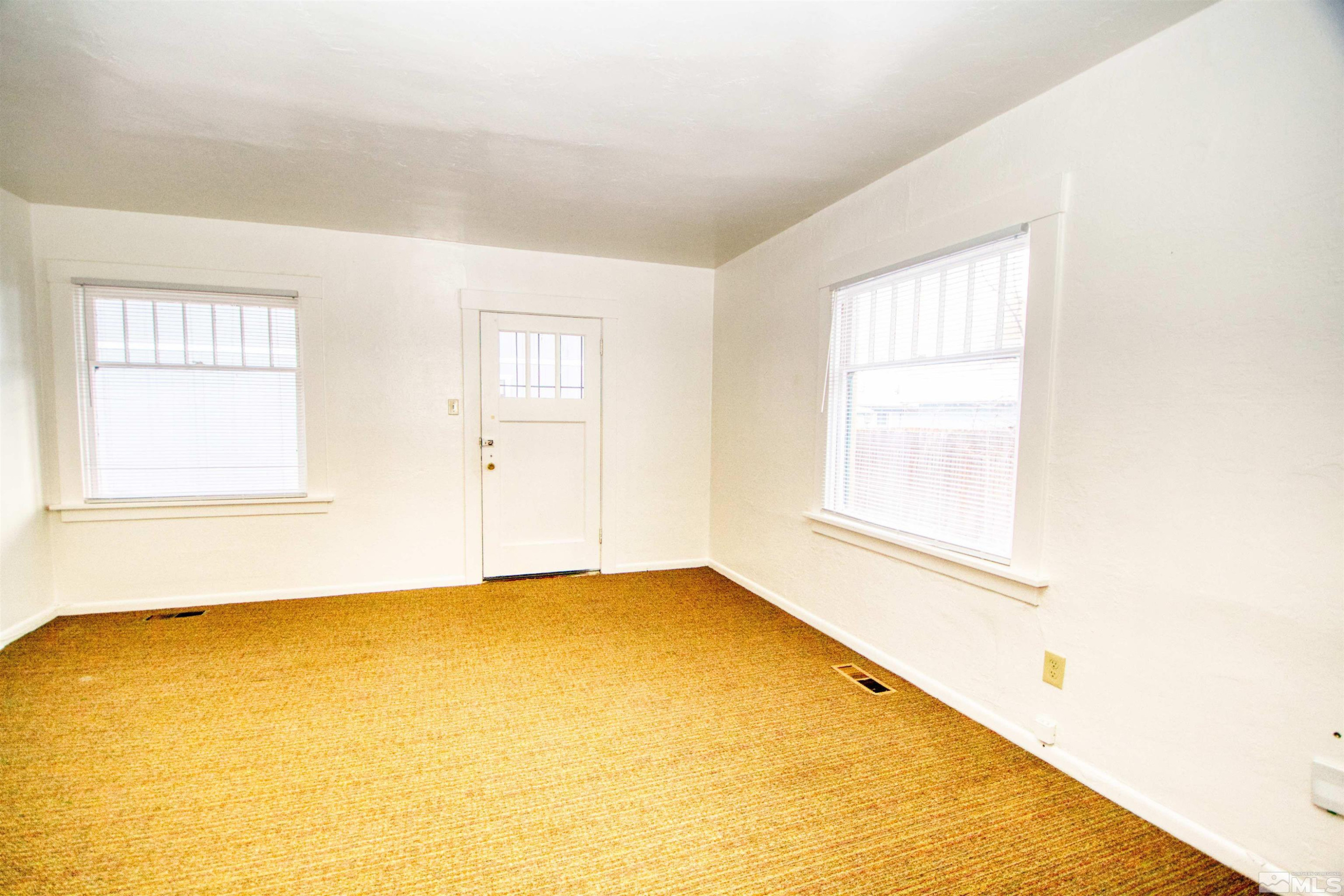 829 Plumas Street, Unit C Reno, NV 89509 - Photo 6 of 12 an empty room with a window