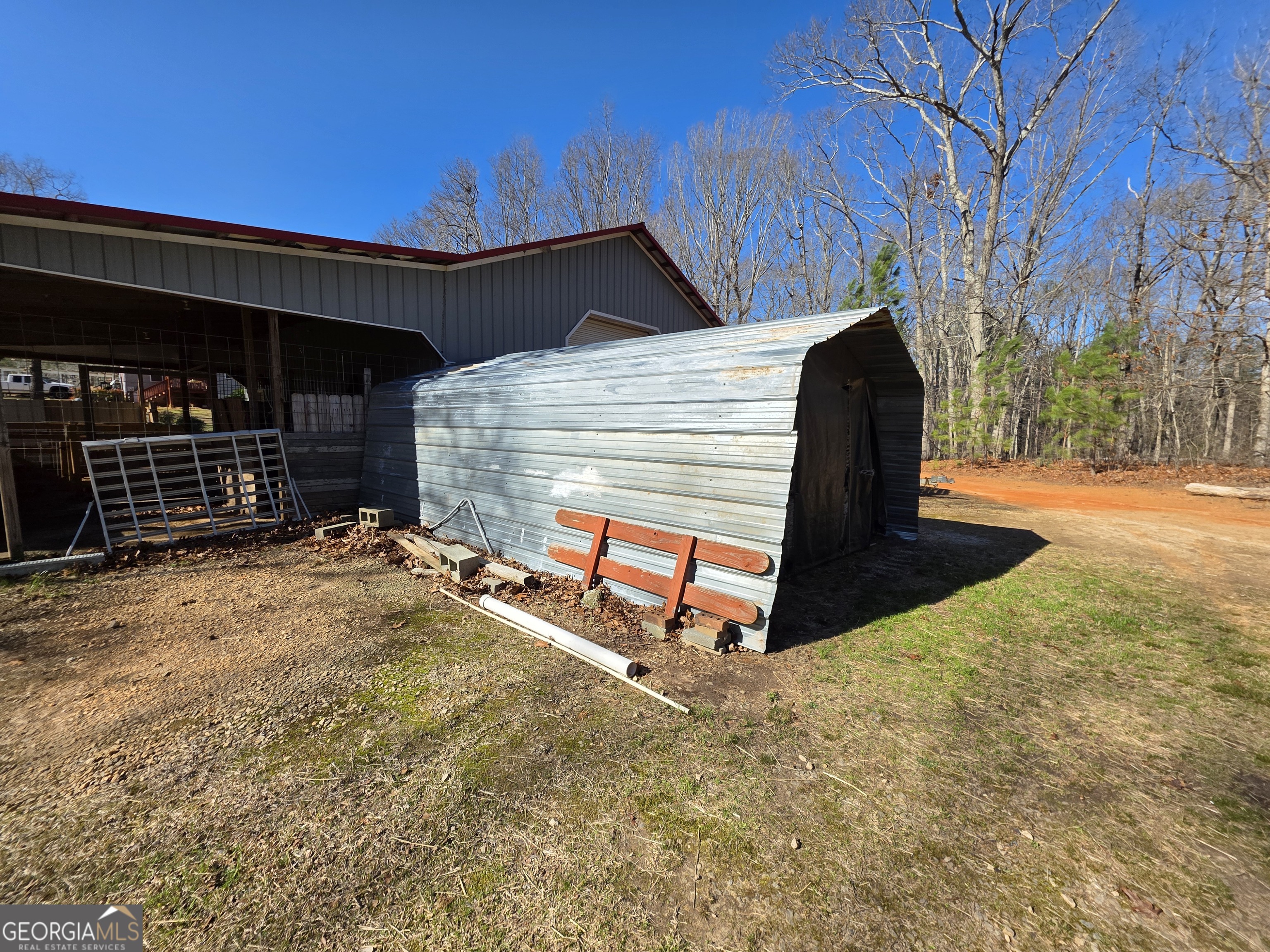 3879 Caney Head Road Roopville, GA 30217 - Photo 14 of 64 a view of backyard with wooden fence