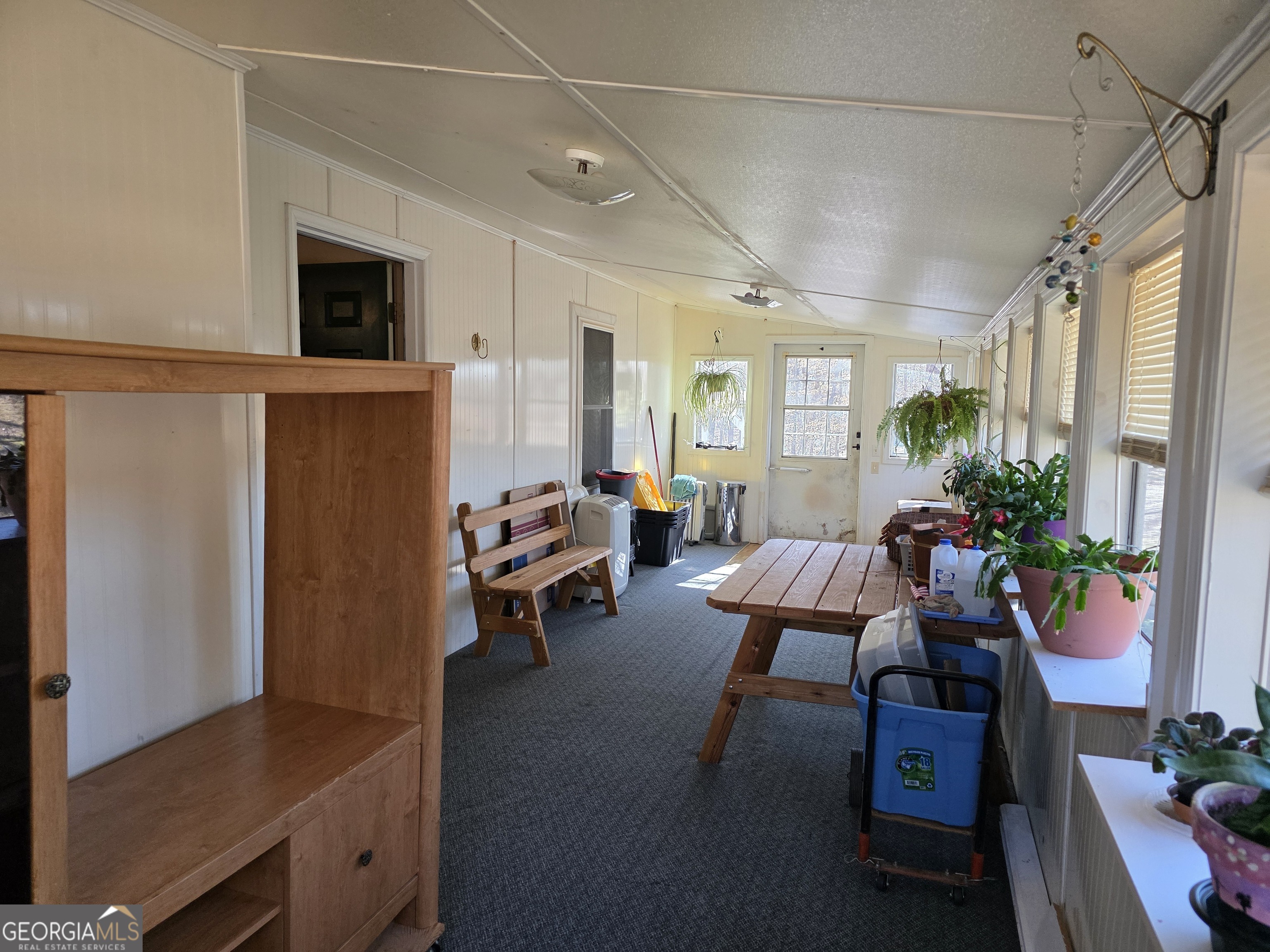 3879 Caney Head Road Roopville, GA 30217 - Photo 15 of 64 a living room with furniture and a potted plant