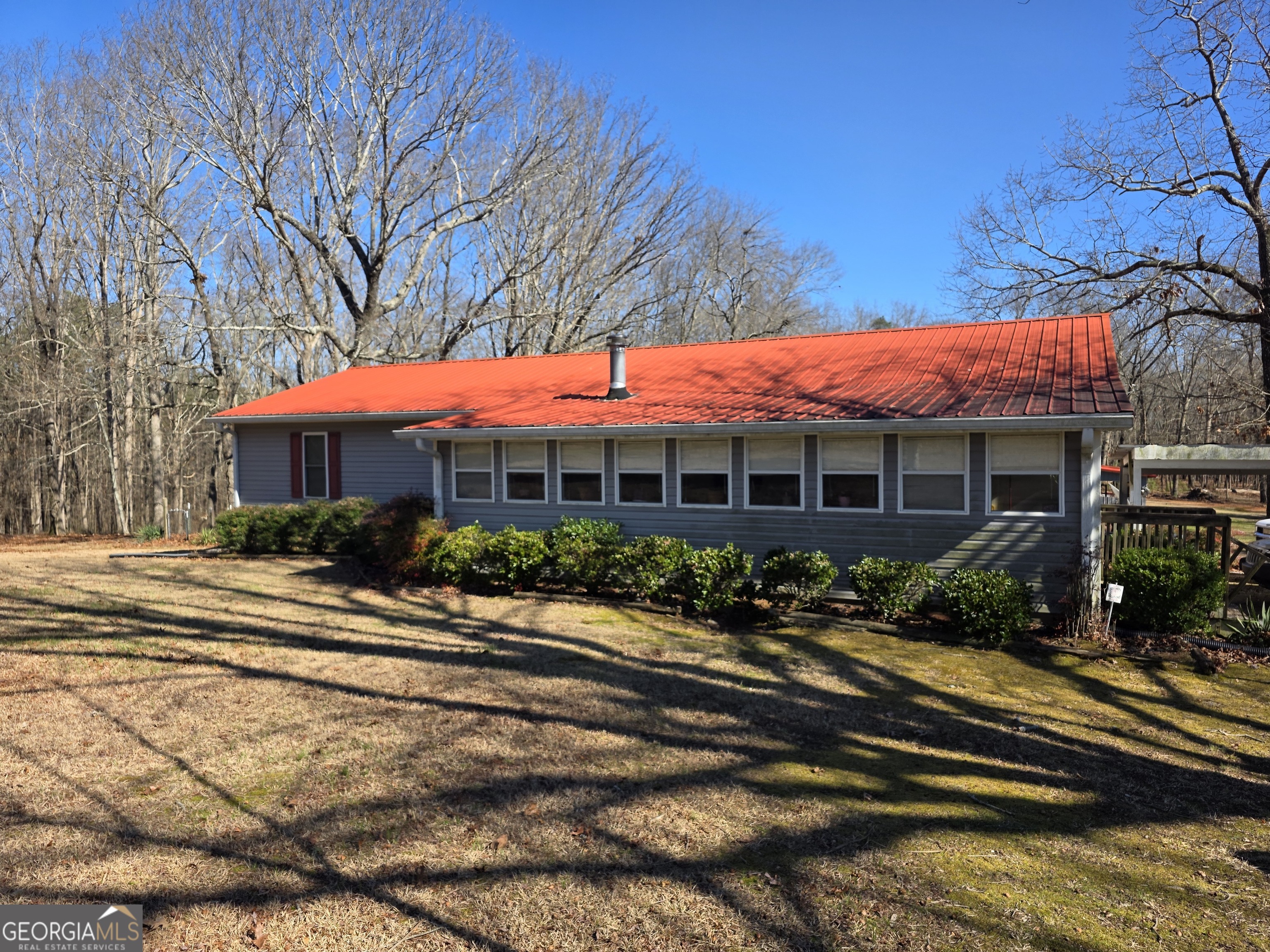 3879 Caney Head Road Roopville, GA 30217 - Photo 2 of 64 a front view of a house with a yard