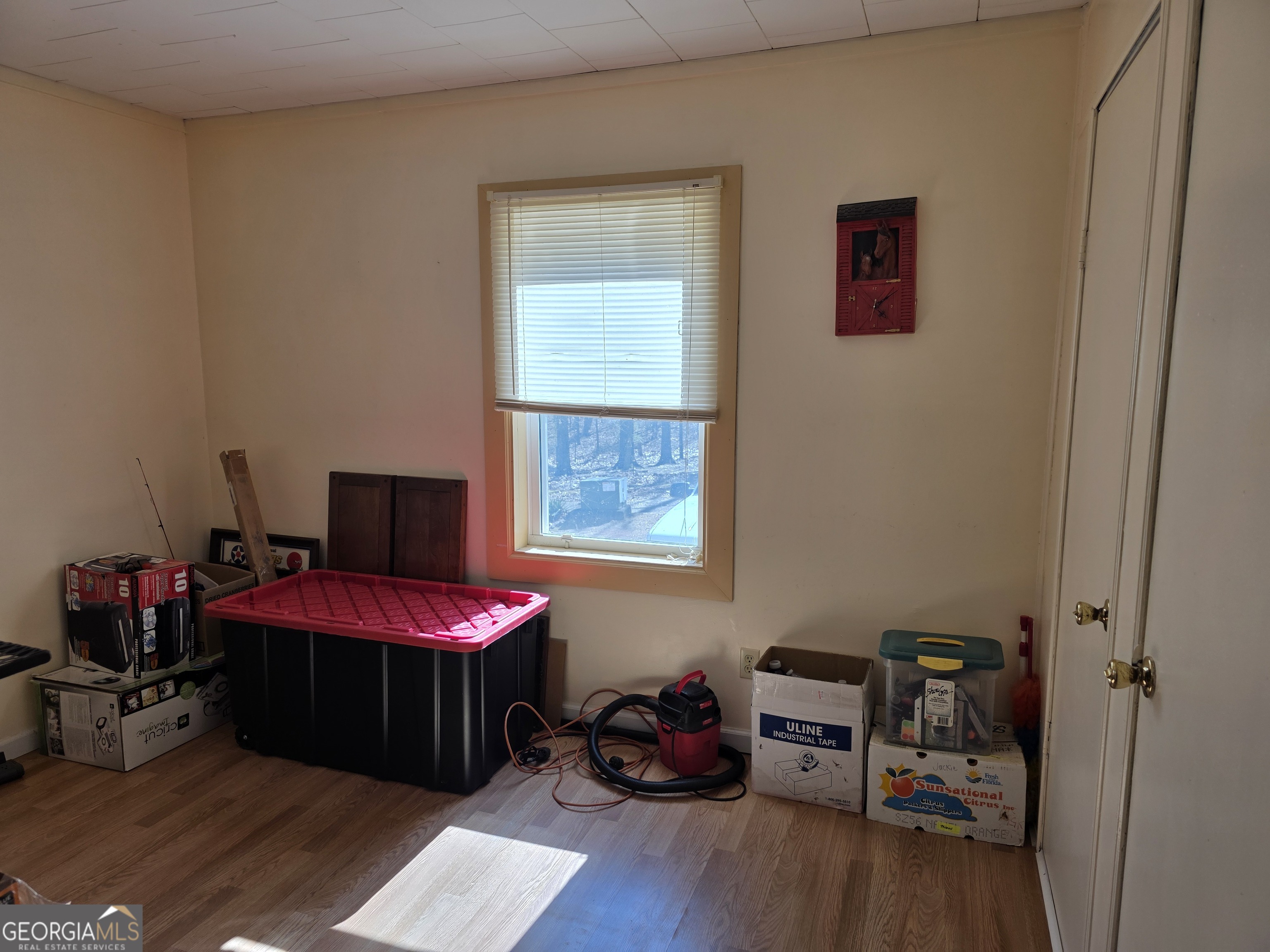 3879 Caney Head Road Roopville, GA 30217 - Photo 32 of 64 a bedroom with furniture and a window