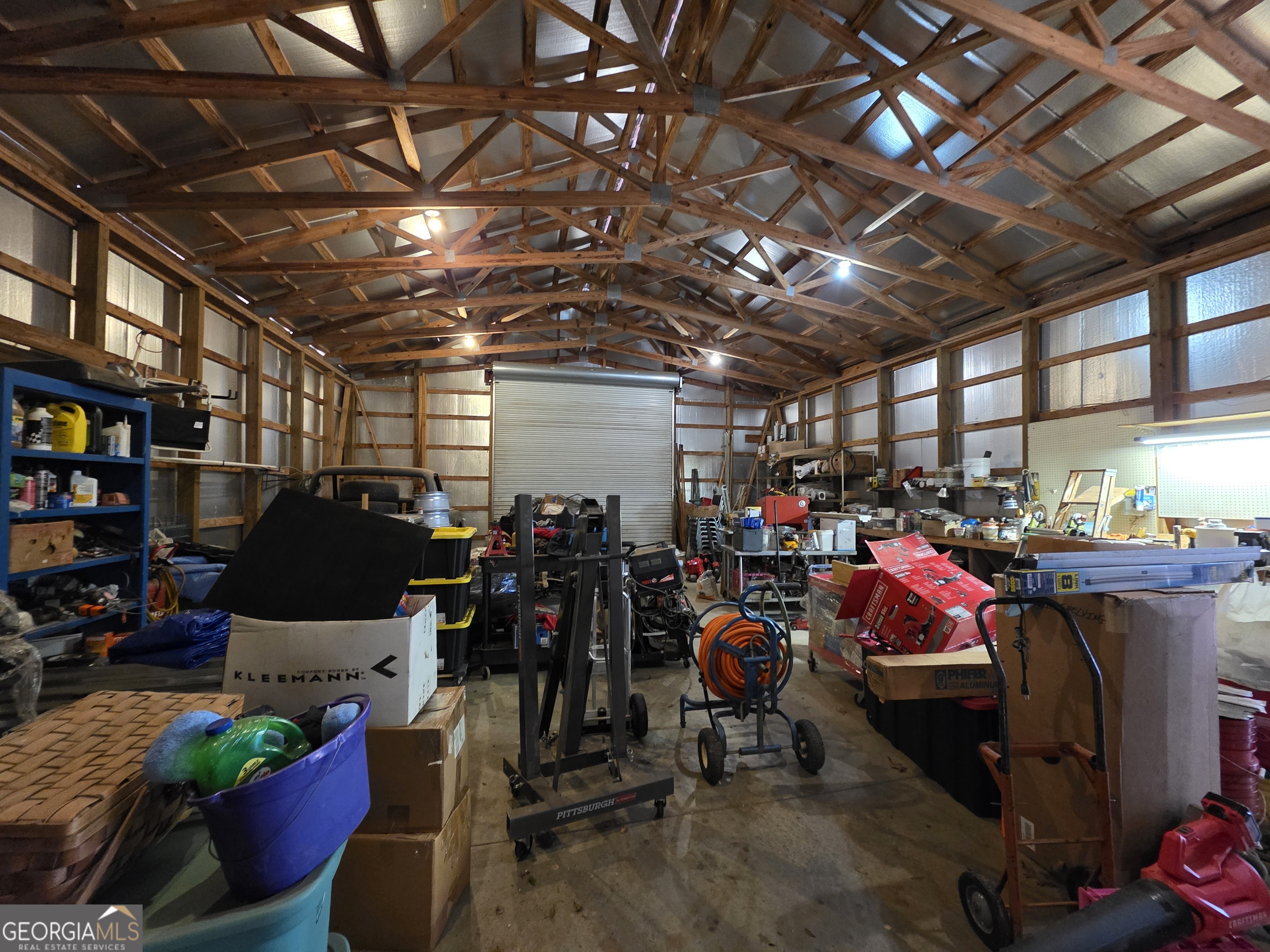 3879 Caney Head Road Roopville, GA 30217 - Photo 10 of 64 a view of a storage room with lots of stuff